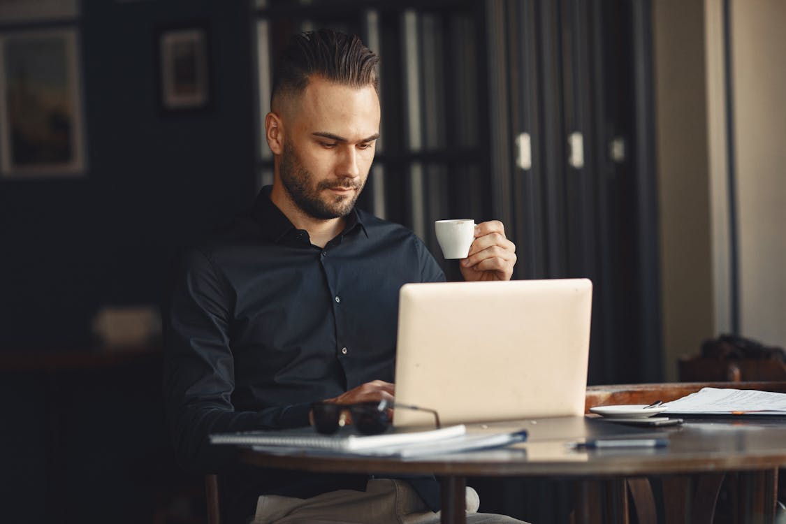 Freelancer working productively on laptop